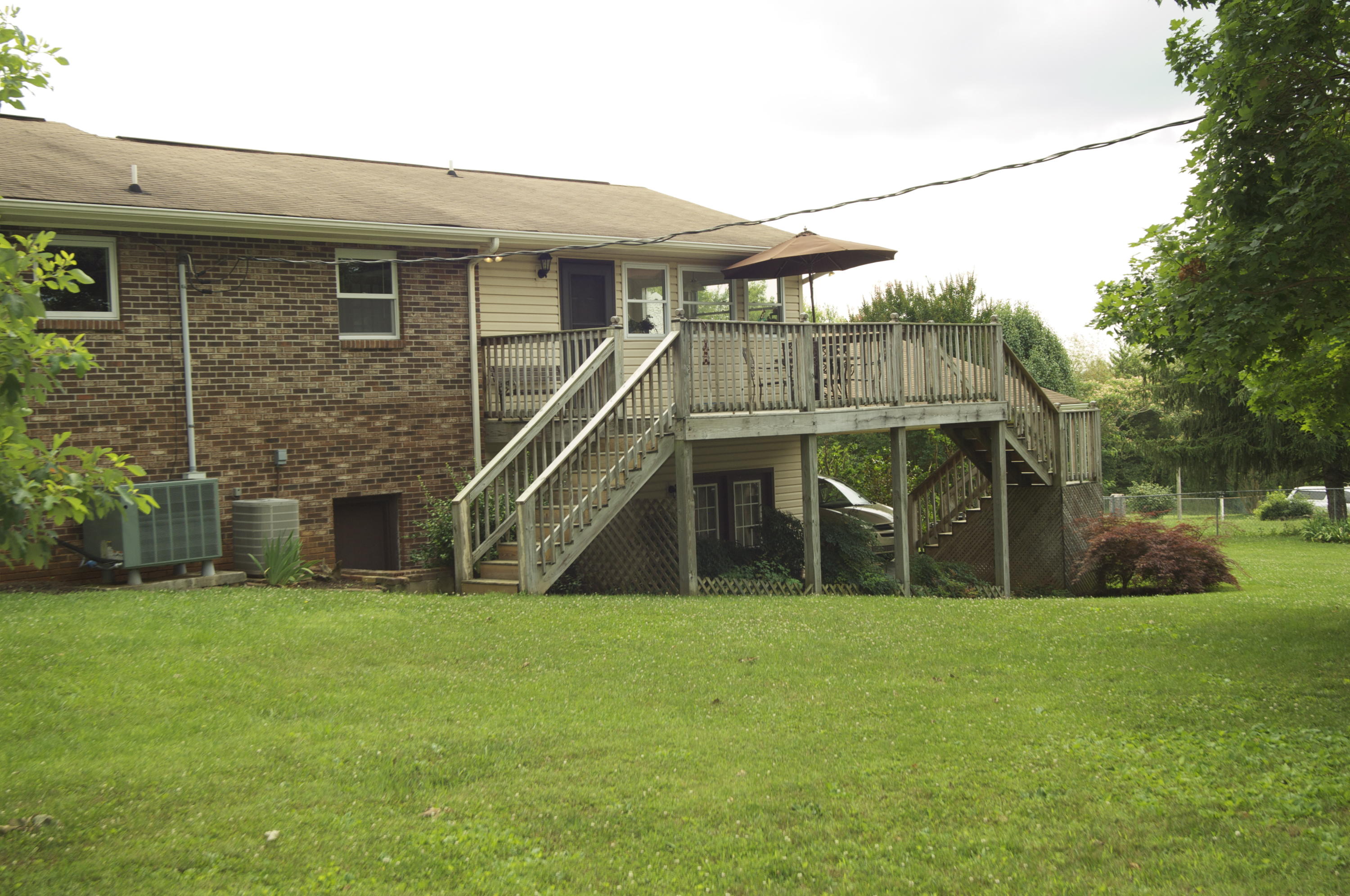 8040 Shannon Hills Road Corryton, TN 37721 - Photo 22 of 25 Deck with Covered Patio