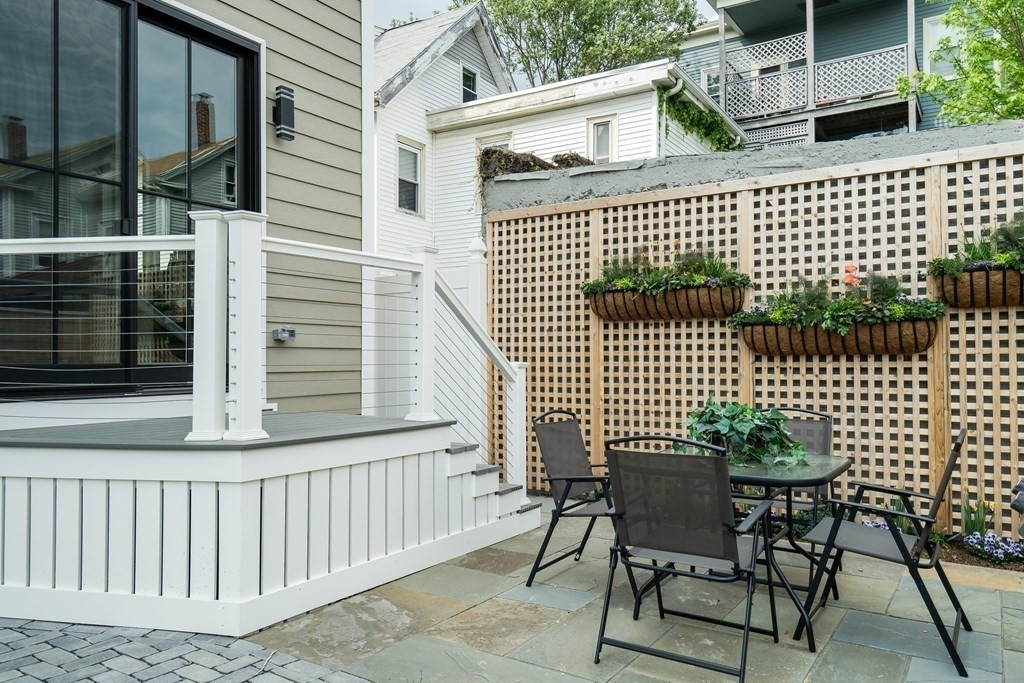 25 Quincy Street, Unit R Somerville, MA 02143 - Photo 16 of 17 a view of a chair and table in the balcony