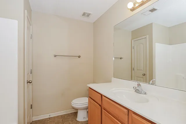 a bathroom with a sink and a toilet