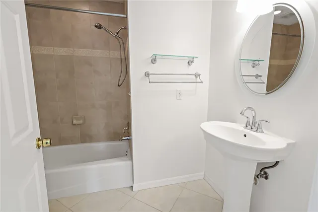 a view of a car parked in front of a house