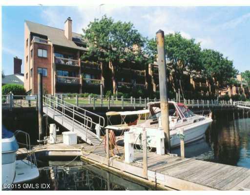 7 River Road, Unit 301 Cos Cob, CT 06807 - Photo 3 of 3 a view of a balcony with chairs