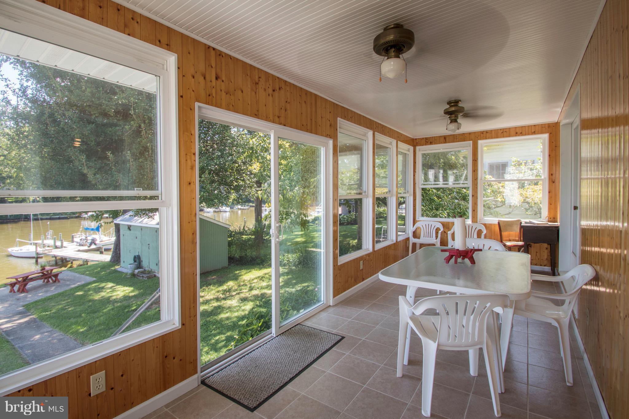 713 Red Cedar Road Annapolis, MD 21409 - Photo 22 of 30 Sunroom makes for the best seat in the house