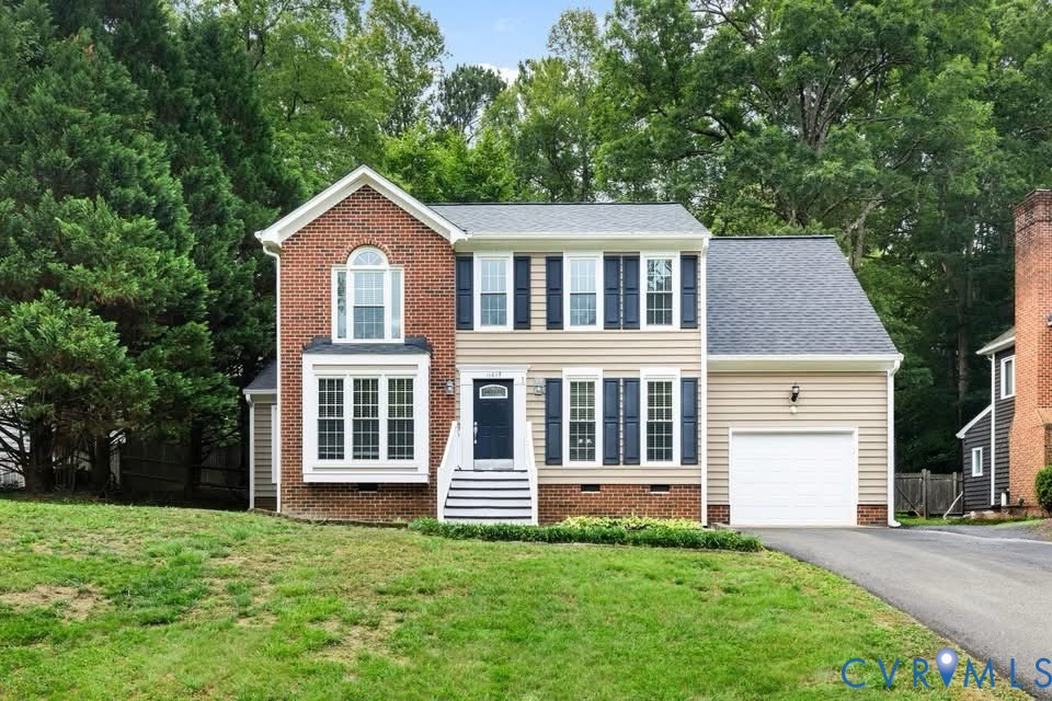 11017 Corryville Road North Chesterfield, VA 23236 - Photo 2 of 32 a front view of a house with a yard