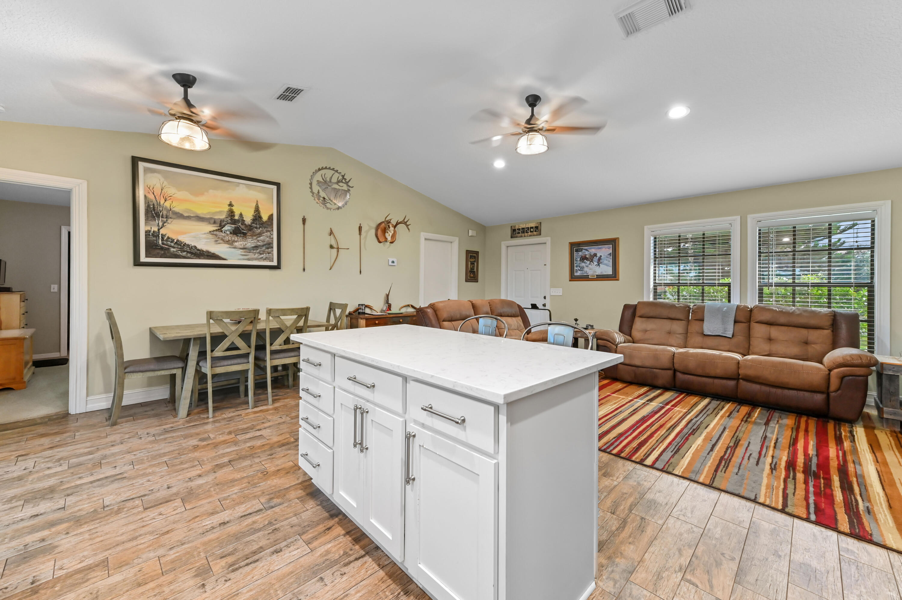 665 Southwest Backert Avenue Port St. Lucie, FL 34953 - Photo 15 of 46 a living room with furniture and a table