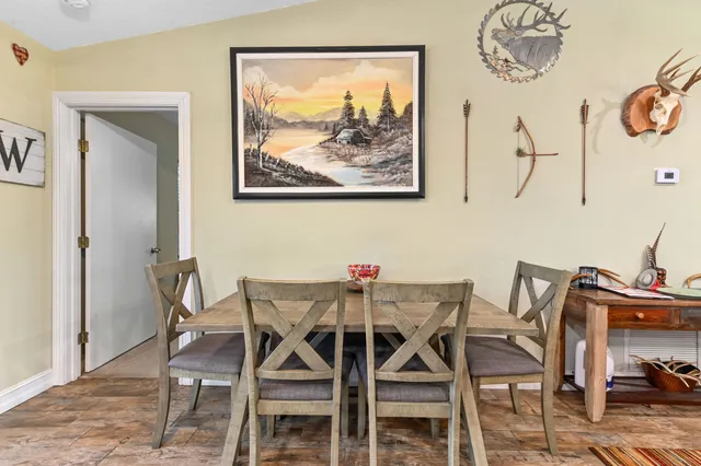 a bedroom with a bed and dresser