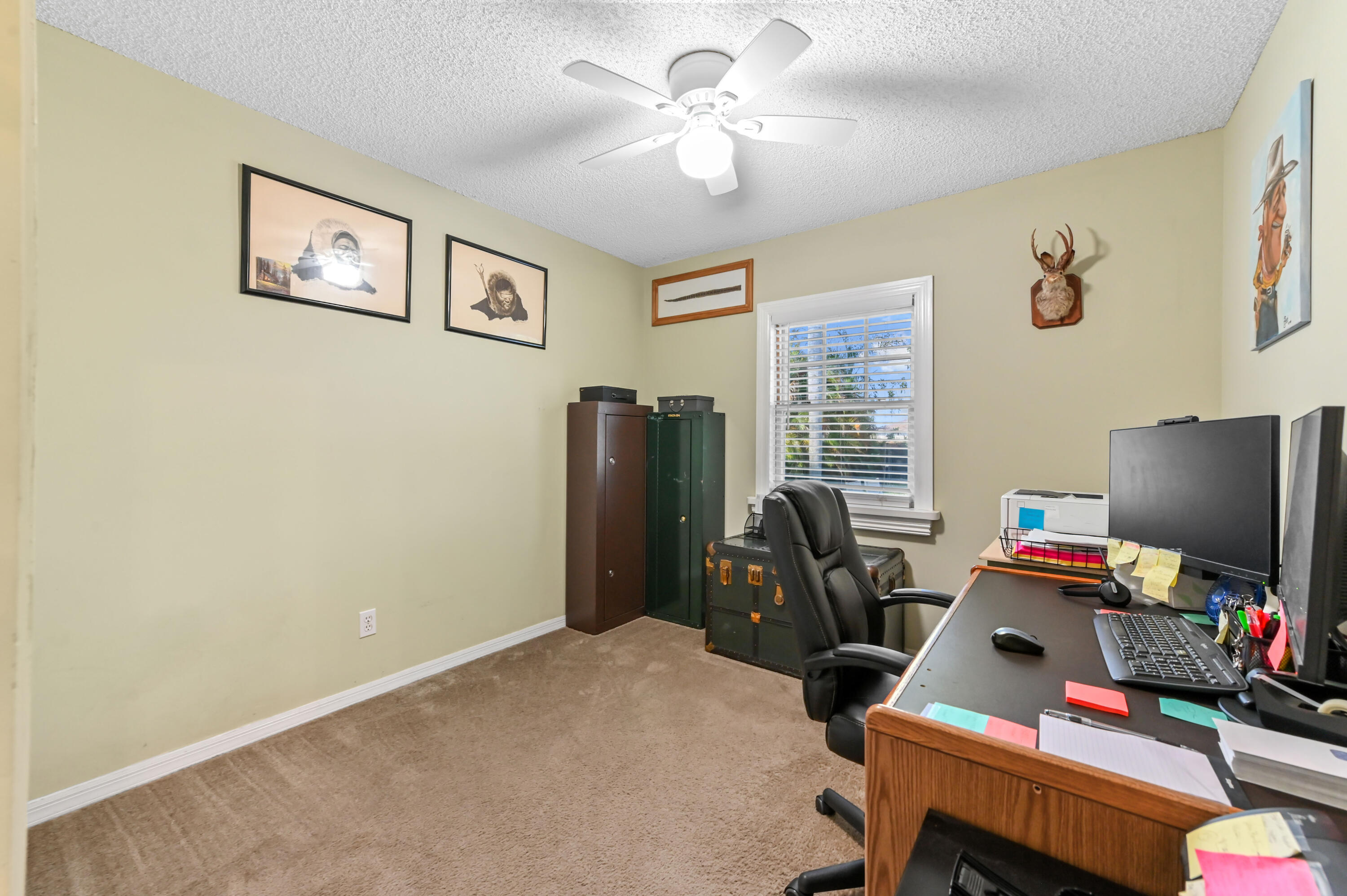 665 Southwest Backert Avenue Port St. Lucie, FL 34953 - Photo 19 of 46 a room with furniture and window