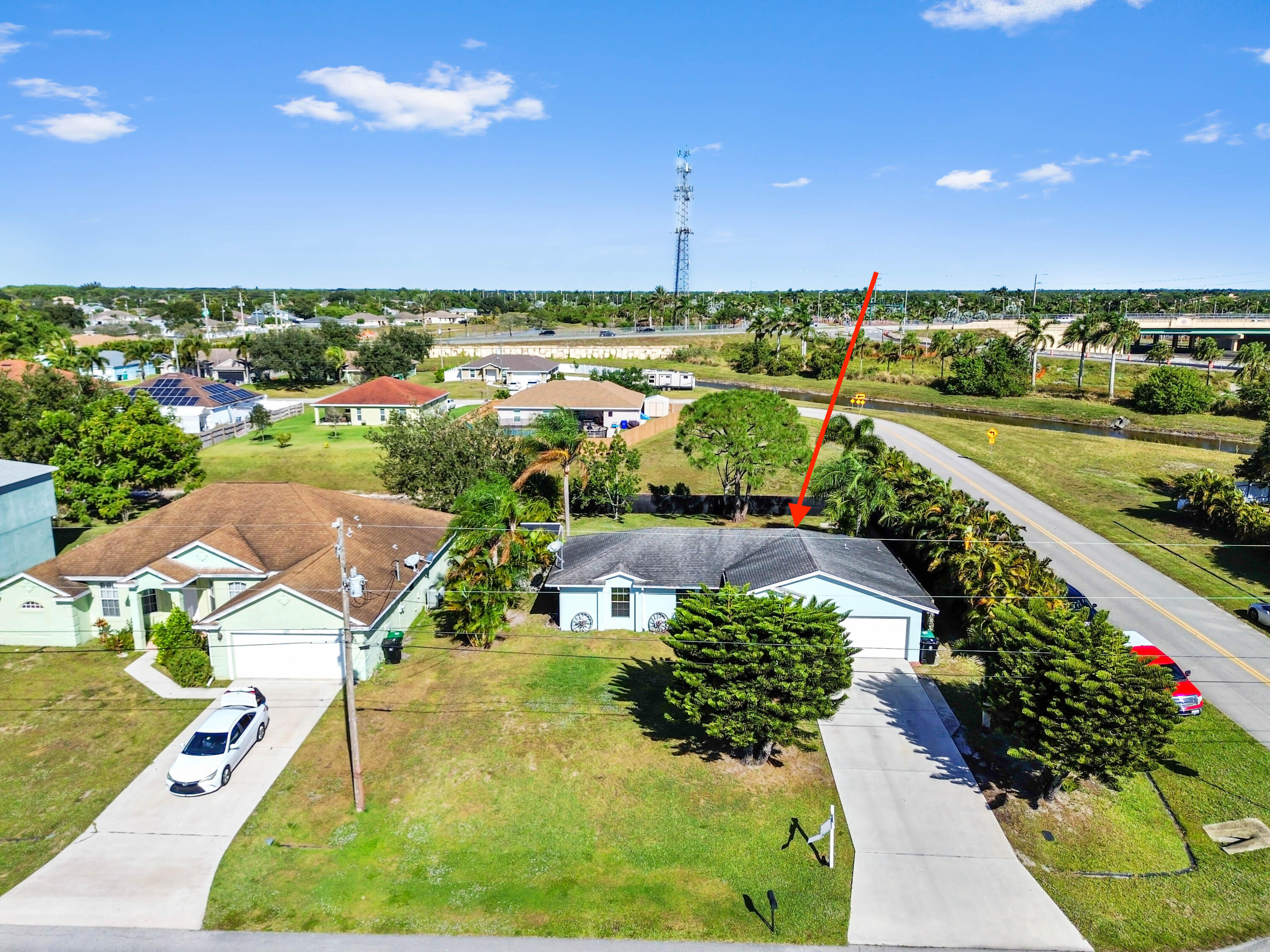 665 Southwest Backert Avenue Port St. Lucie, FL 34953 - Photo 2 of 46 an aerial view of a city