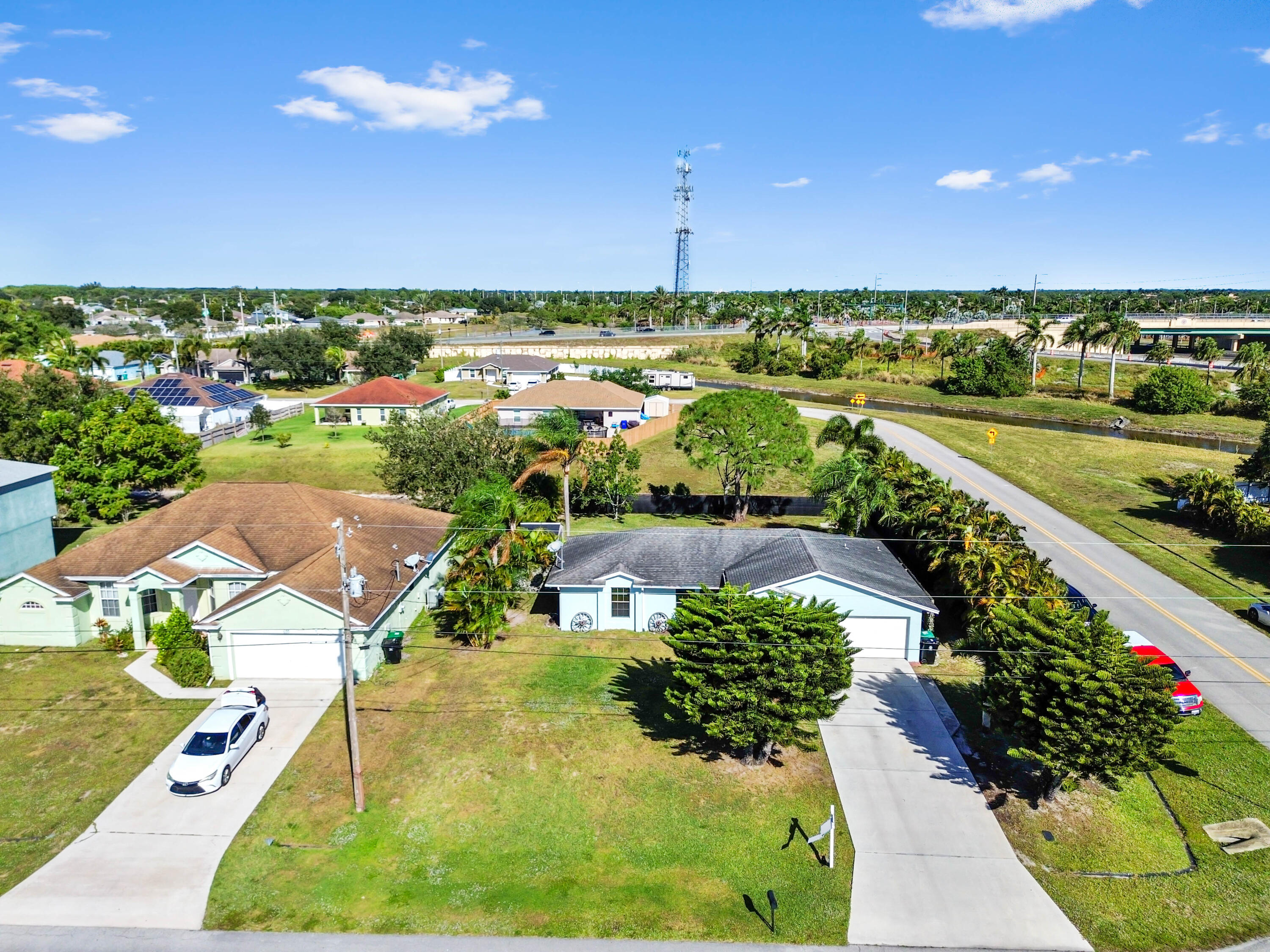 665 Southwest Backert Avenue Port St. Lucie, FL 34953 - Photo 36 of 46 an aerial view of a city
