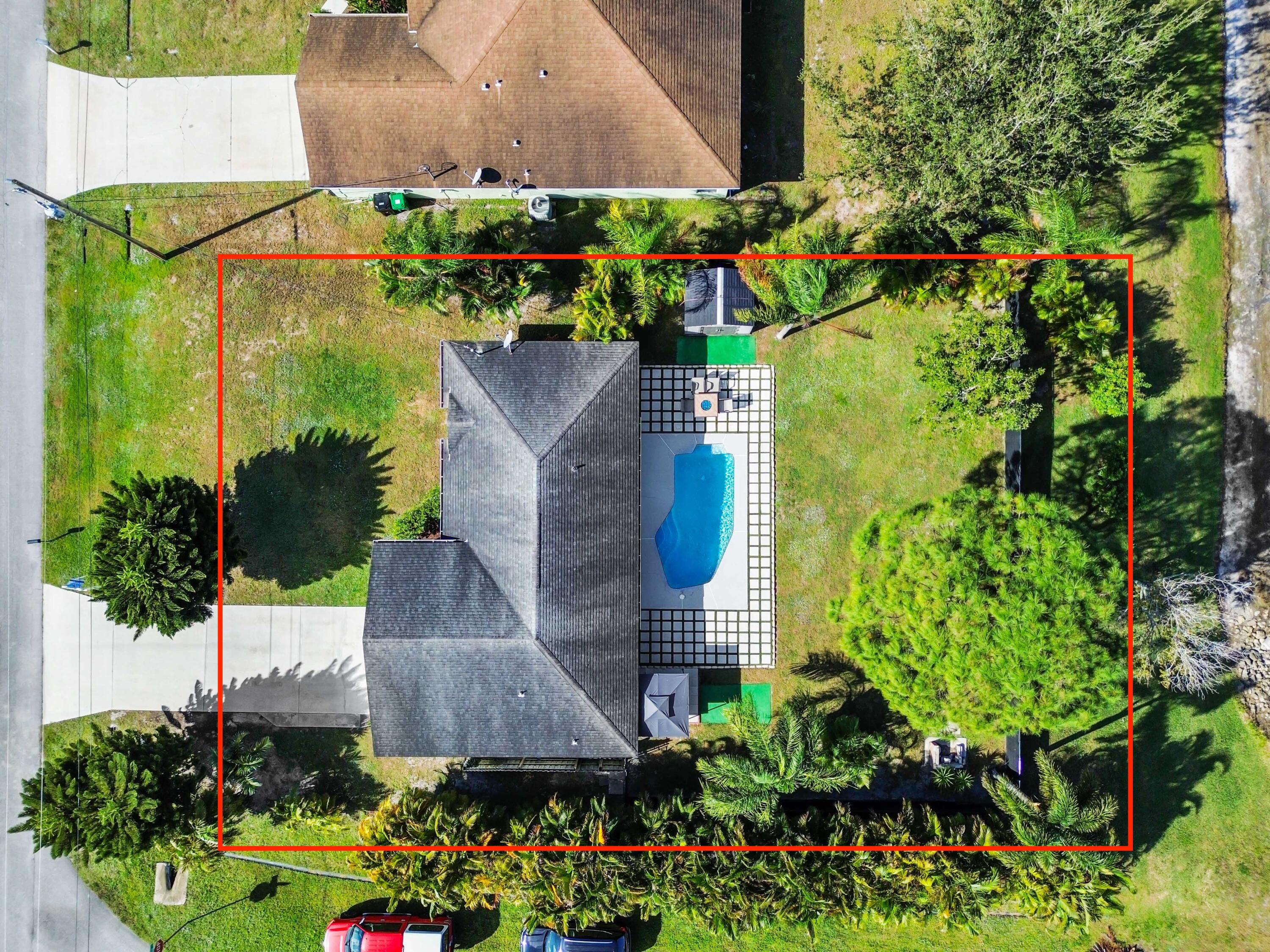 665 Southwest Backert Avenue Port St. Lucie, FL 34953 - Photo 45 of 46 an aerial view of a house with a yard and garden