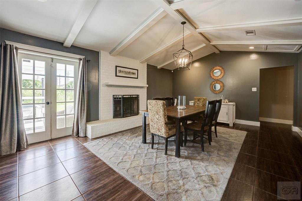 10213 Stewart Road Galveston, TX 77554 - Photo 9 of 49 a view of a dining room with furniture