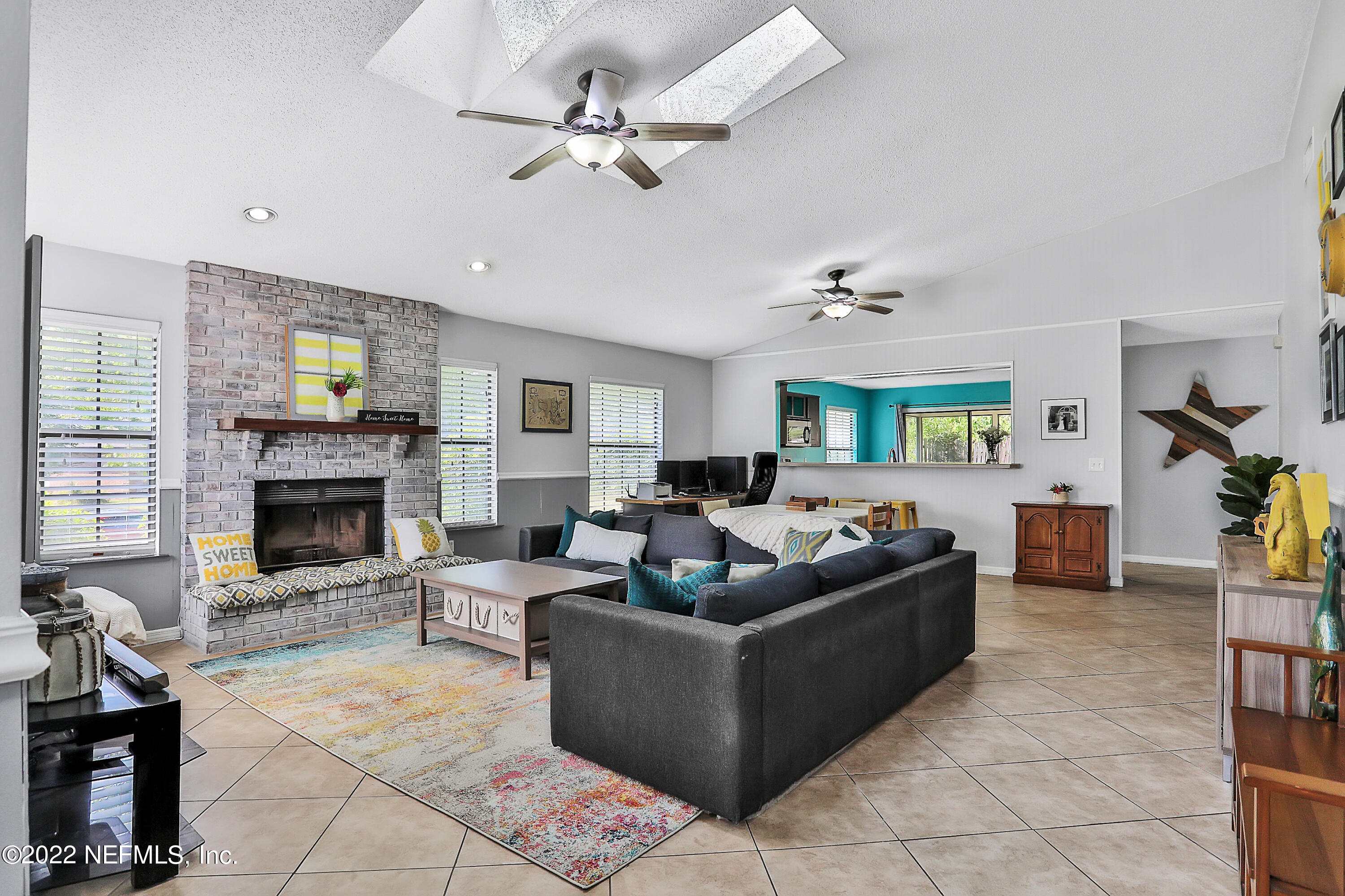 3973 High Pine Road Jacksonville, FL 32225 - Photo 5 of 45 Living room with skylights
