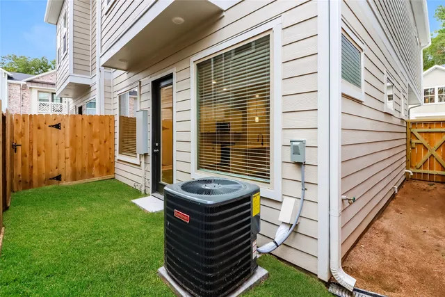 a view of a backyard with sitting area