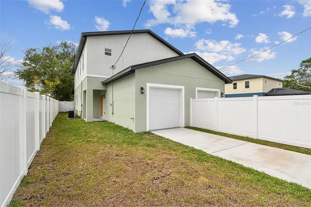 a house with trees in front of it