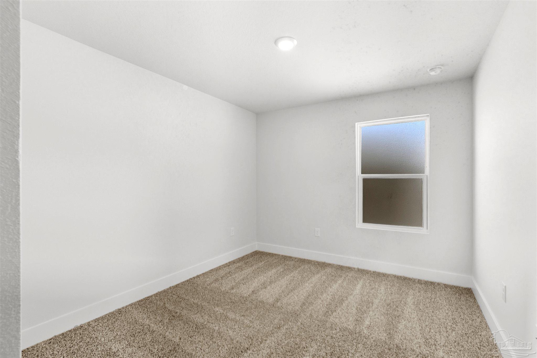 3162 Serviceberry Road Cantonment, FL 32533 - Photo 25 of 35 an empty room with a window