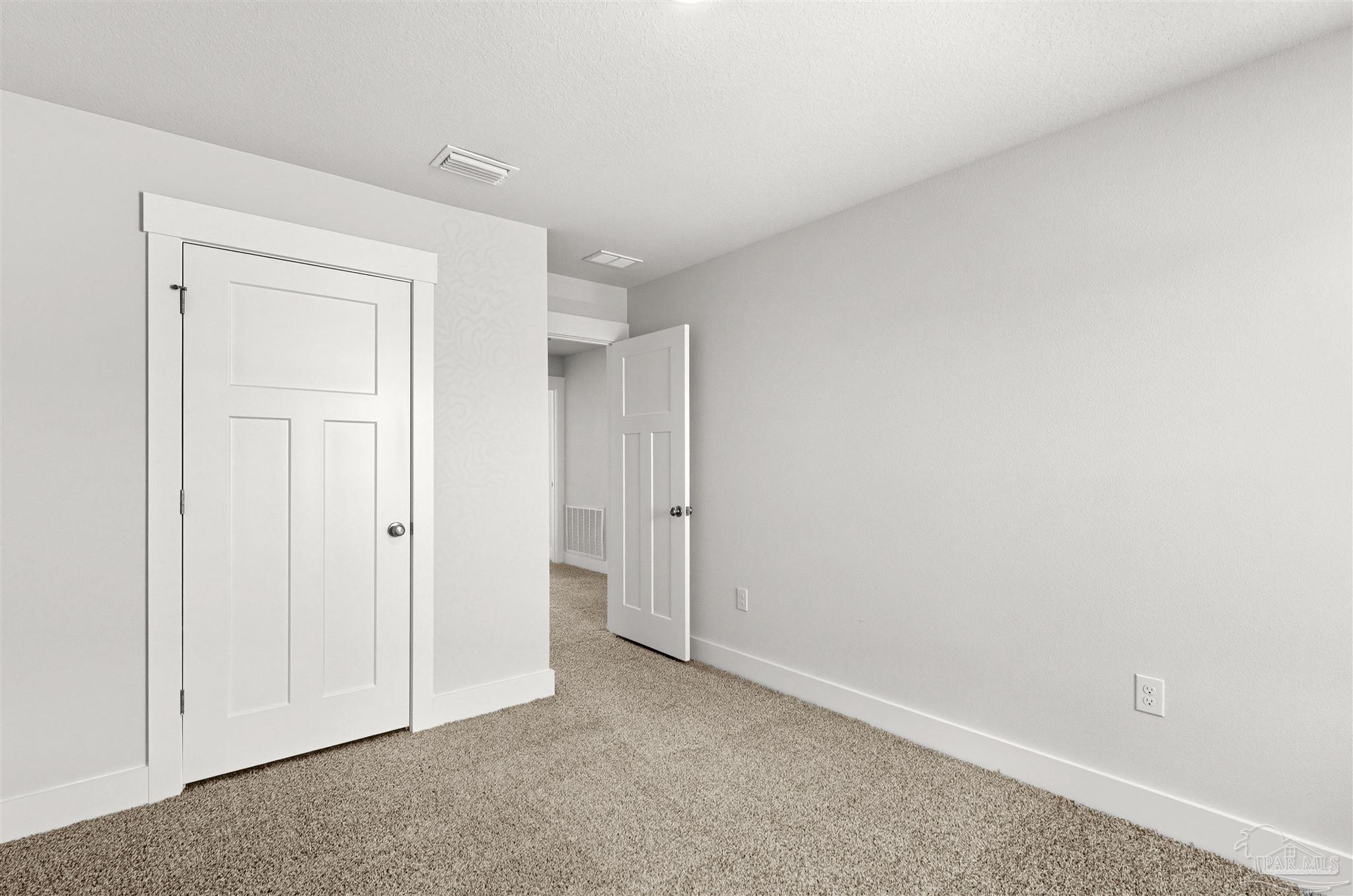 3162 Serviceberry Road Cantonment, FL 32533 - Photo 28 of 35 an empty room with closet area