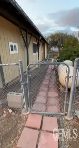 a view of a patio with chair and table