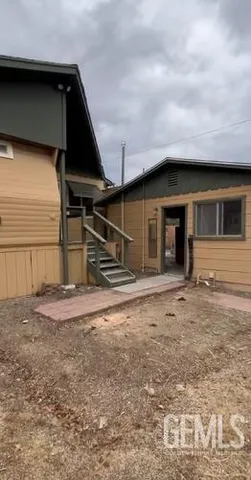 a front view of a house with garage