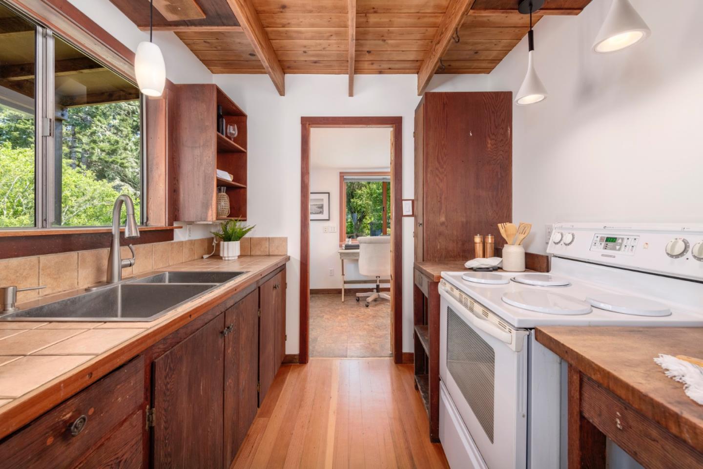 18050 Highway 1 Marshall, CA 94940 - Photo 12 of 65 a kitchen with a sink stove and cabinets