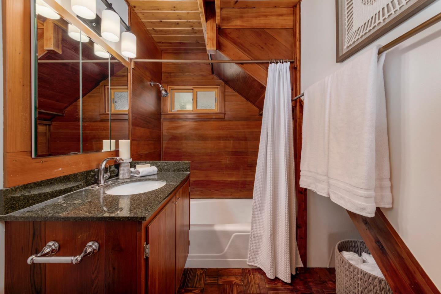 18050 Highway 1 Marshall, CA 94940 - Photo 21 of 65 a bathroom with a sink and a mirror