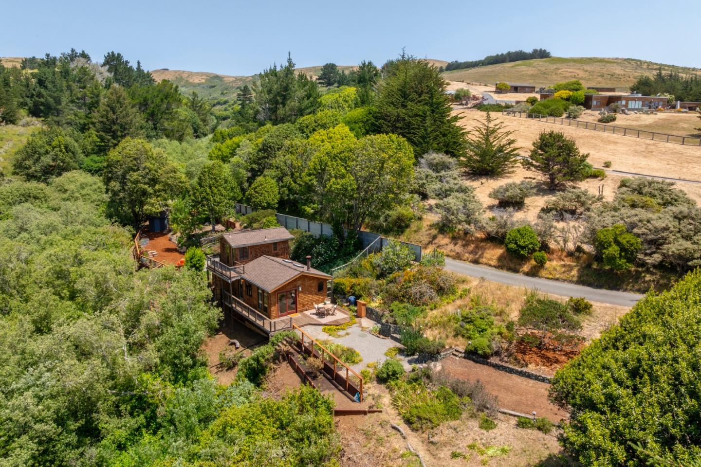 18050 Highway 1 Marshall, CA 94940 - Photo 26 of 65 an aerial view of a house with a yard