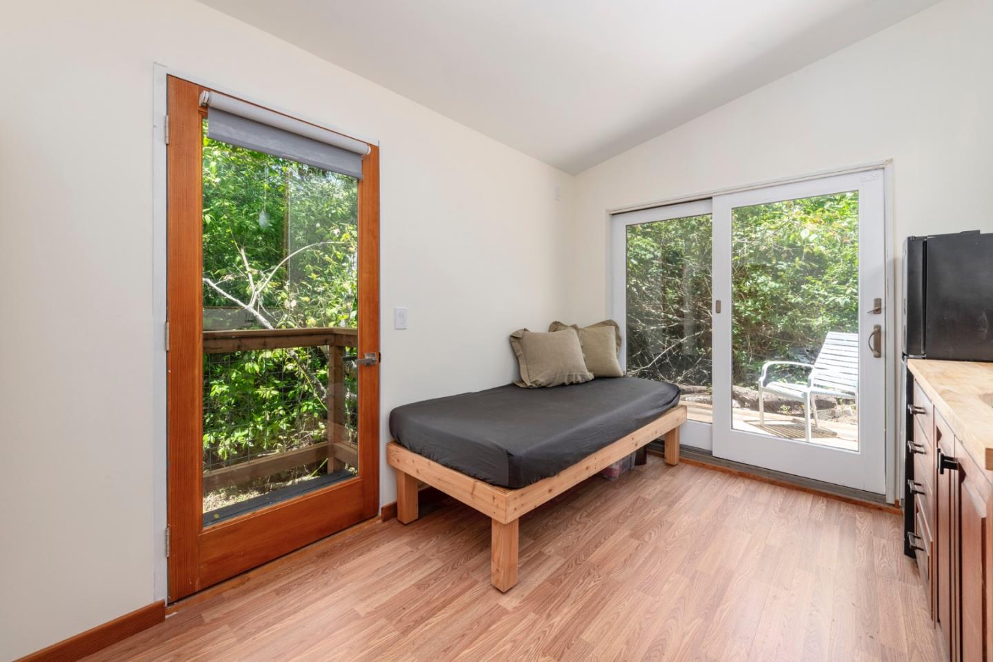 18050 Highway 1 Marshall, CA 94940 - Photo 30 of 65 a living room with furniture and a flat screen tv