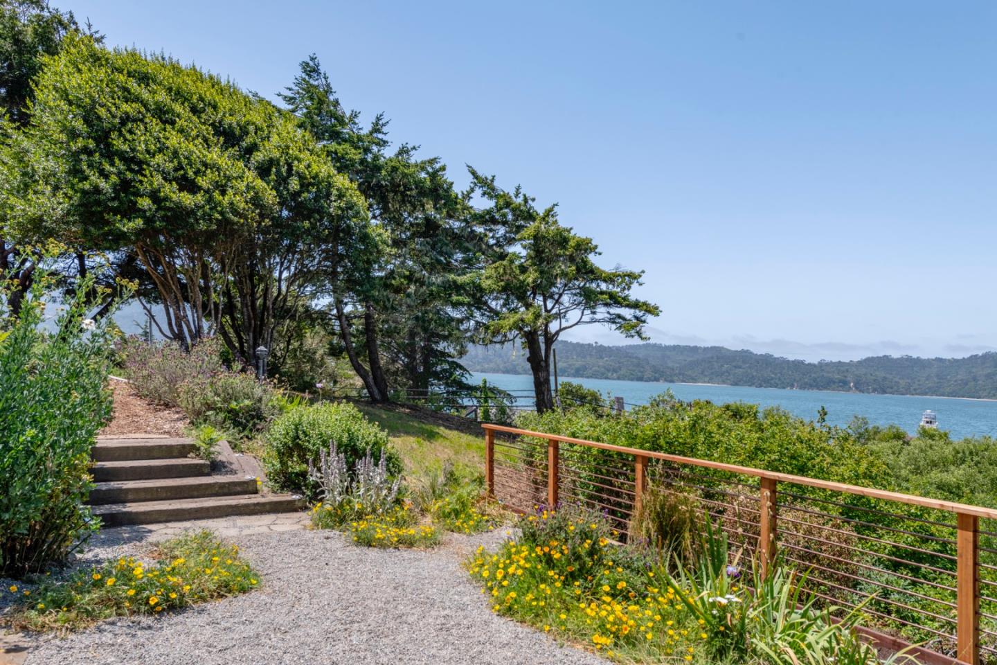 18050 Highway 1 Marshall, CA 94940 - Photo 56 of 65 a view of a garden with wooden bridge