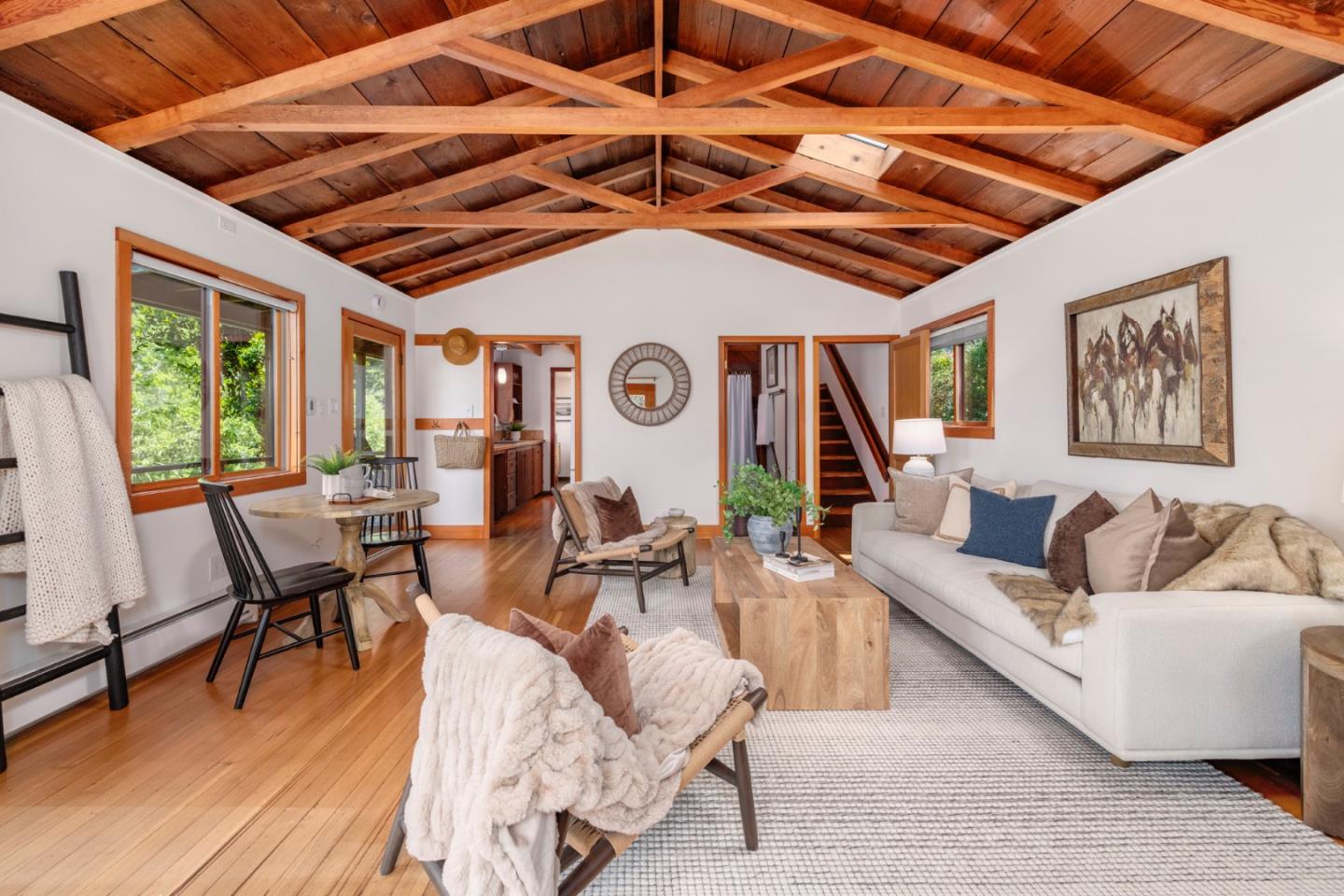 18050 Highway 1 Marshall, CA 94940 - Photo 6 of 65 a living room with furniture and wooden floor