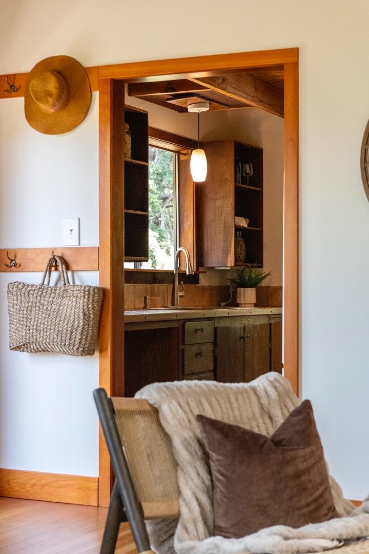 18050 Highway 1 Marshall, CA 94940 - Photo 8 of 65 a bedroom with a bed and a dresser