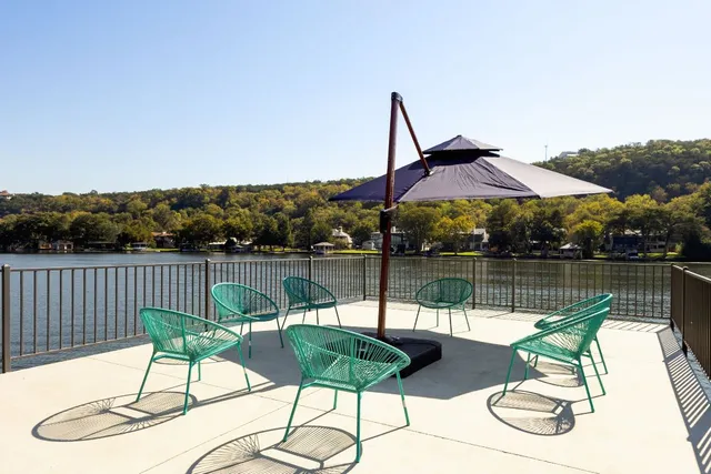 a lake view with a seating space