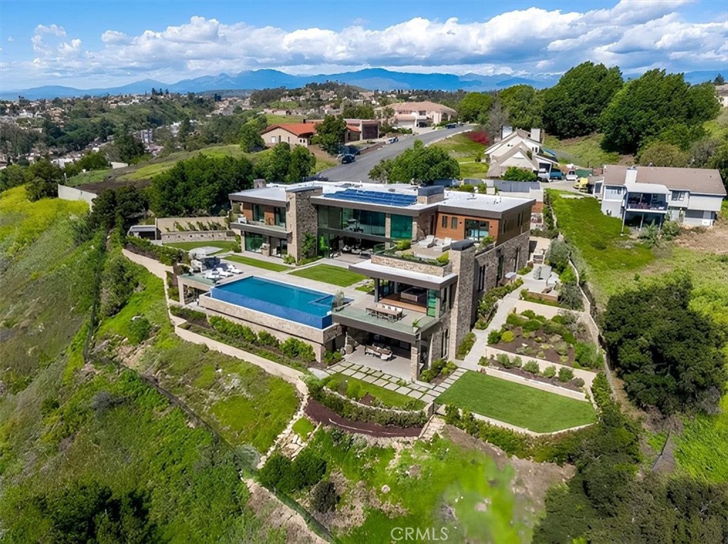 22303 Broken Twig Road Diamond Bar, CA 91765 - Photo 1 of 25 a aerial view of a house with a big yard