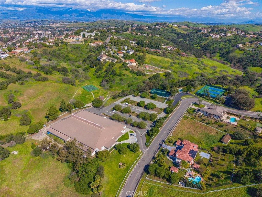 22303 Broken Twig Road Diamond Bar, CA 91765 - Photo 12 of 25 an aerial view of residential houses with outdoor space and seating