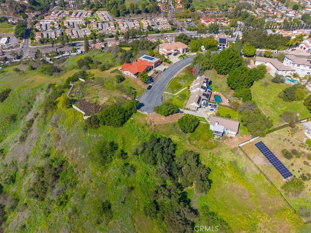 22303 Broken Twig Road Diamond Bar, CA 91765 - Photo 23 of 25 an aerial view of residential houses with outdoor space and trees