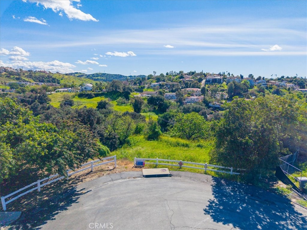 22303 Broken Twig Road Diamond Bar, CA 91765 - Photo 6 of 25 a view of a street with a houses