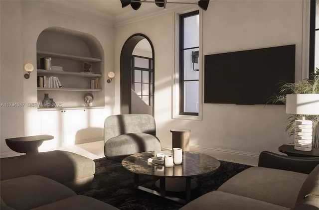 a living room with fireplace furniture and a flat screen tv