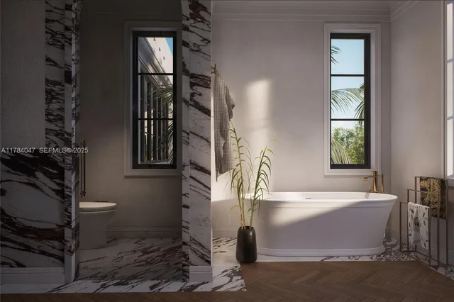 a bathroom with a toilet and a sink