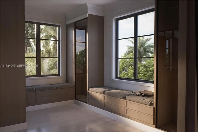 a view of hallway with a large window and wooden floor