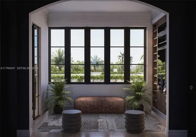 a view of a living room and dining room