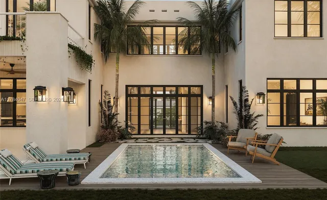 a view of a chairs and table in the patio