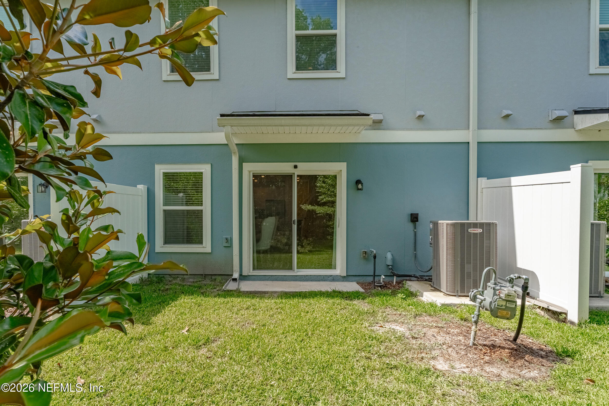 1615 Cluny Road Jacksonville, FL 32218 - Photo 17 of 18 a view of house with backyard space and windows
