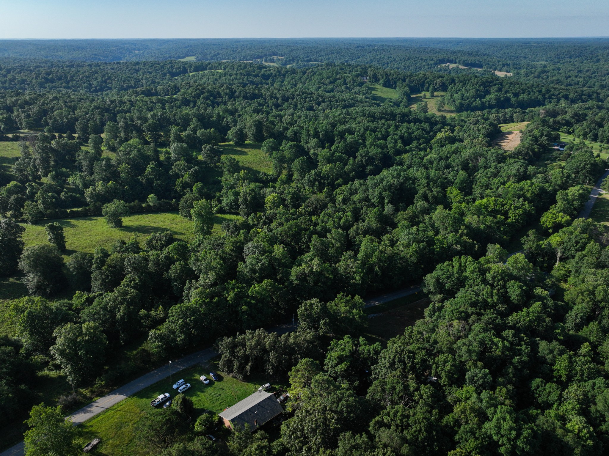 8 Shiloh Canaan Road Palmyra, TN 37142 - Photo 3 of 8 an aerial view of a house with outdoor space and street view