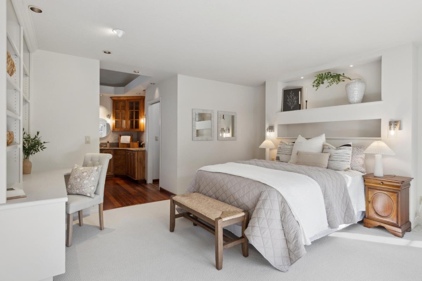 28064 Heron Court Carmel, CA 93923 - Photo 12 of 30 a spacious bedroom with a bed and a chair