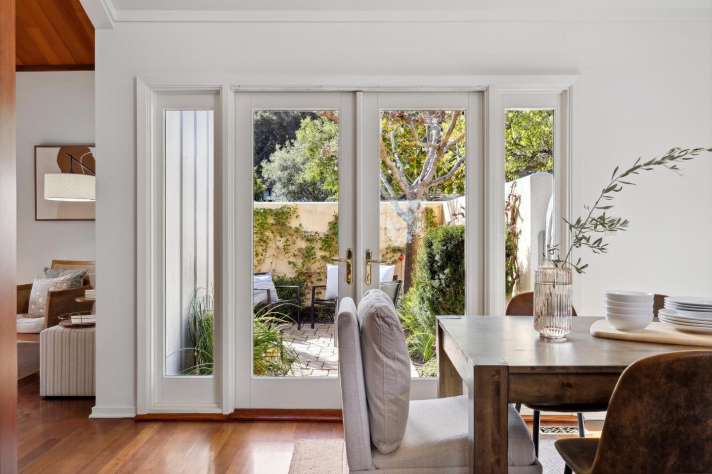 28064 Heron Court Carmel, CA 93923 - Photo 9 of 30 a view of a dining room with furniture and wooden floor