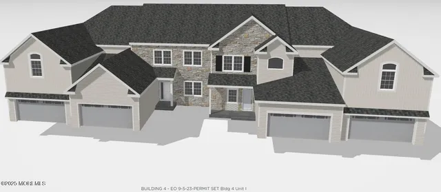 a white house with a large window and balcony