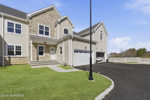 a house view with a garden space