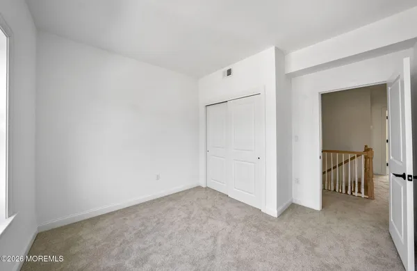 a view of a room with an empty space