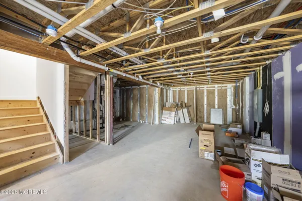 a view of a storage room with stairs
