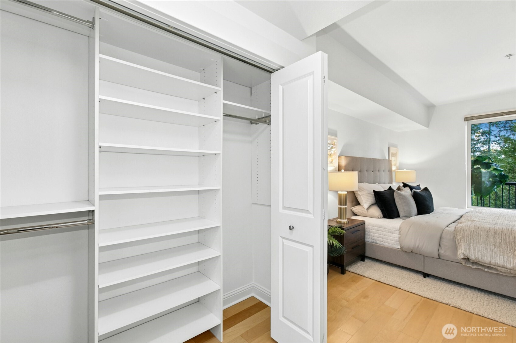 18707 Southeast Newport Way, Unit 102 Issaquah, WA 98027 - Photo 15 of 34 a room with a bed and a cabinets