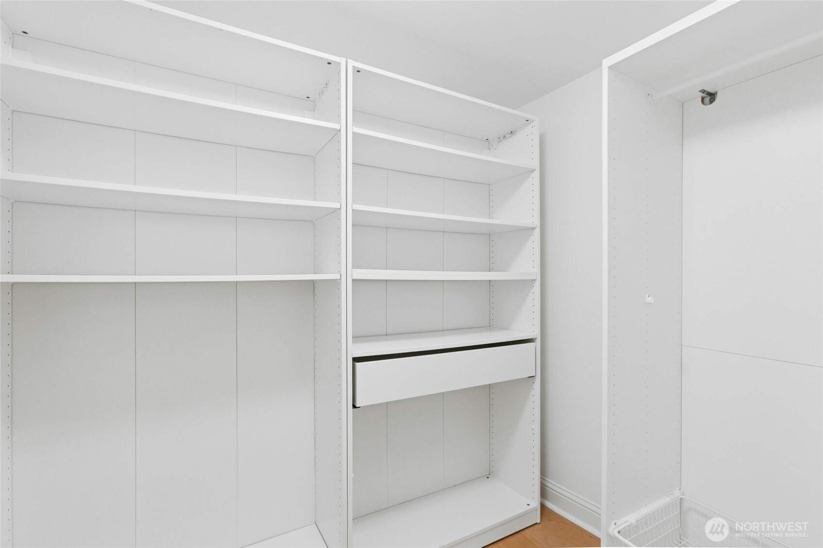 18707 Southeast Newport Way, Unit 102 Issaquah, WA 98027 - Photo 20 of 34 a view of an empty walk in closet