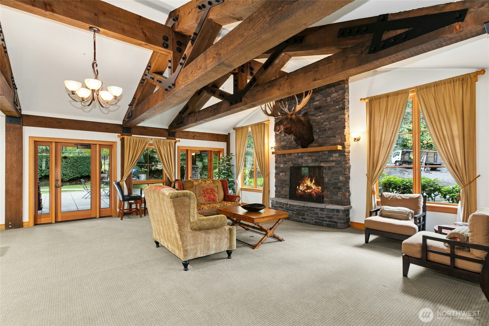 18707 Southeast Newport Way, Unit 102 Issaquah, WA 98027 - Photo 28 of 34 a living room with furniture and a fireplace