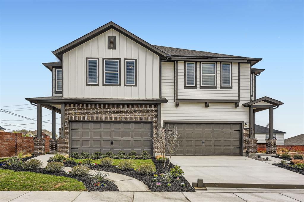 a front view of a house with yard